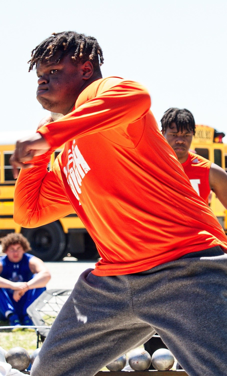 Mineola's D.J. Newsome won district champion in shot-put with a 43’1” heave, followed by fellow Yellowjacket thrower Stephen Ogueri at 41'1.75" in 2nd. [admire more awesome athletics]